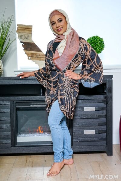 Pretty hijabi whore brunette Brianna Bourbon gets a facial after cumming a big cock. Image #2