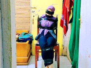 Hijab Indo Taped to a Chair
