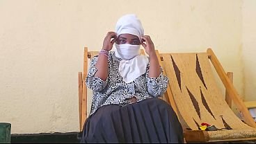 Splendid chubby harem woman wearing hijab taking care of herself